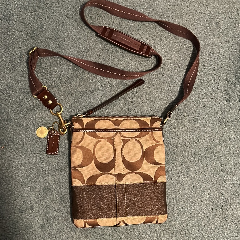 Coach brown signature stripe crossbody.